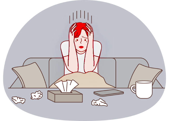  An illustration of a person with long red hair sitting on a sofa, holding their head in their hands in distress. There are pain lines radiating from their head, suggesting a headache or migraine. A tissue box, phone, mug, and crumpled tissues are scattered on the coffee table in front of them, perfectly capturing the 5am migraine nightmare struggle described in the post.