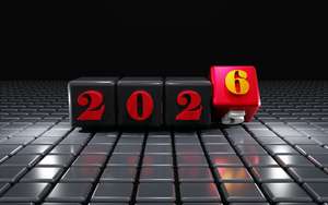 Black and red cubes showing "2025" with the final dice mid-flip from 5 to 6, symbolising the transition into 2026.