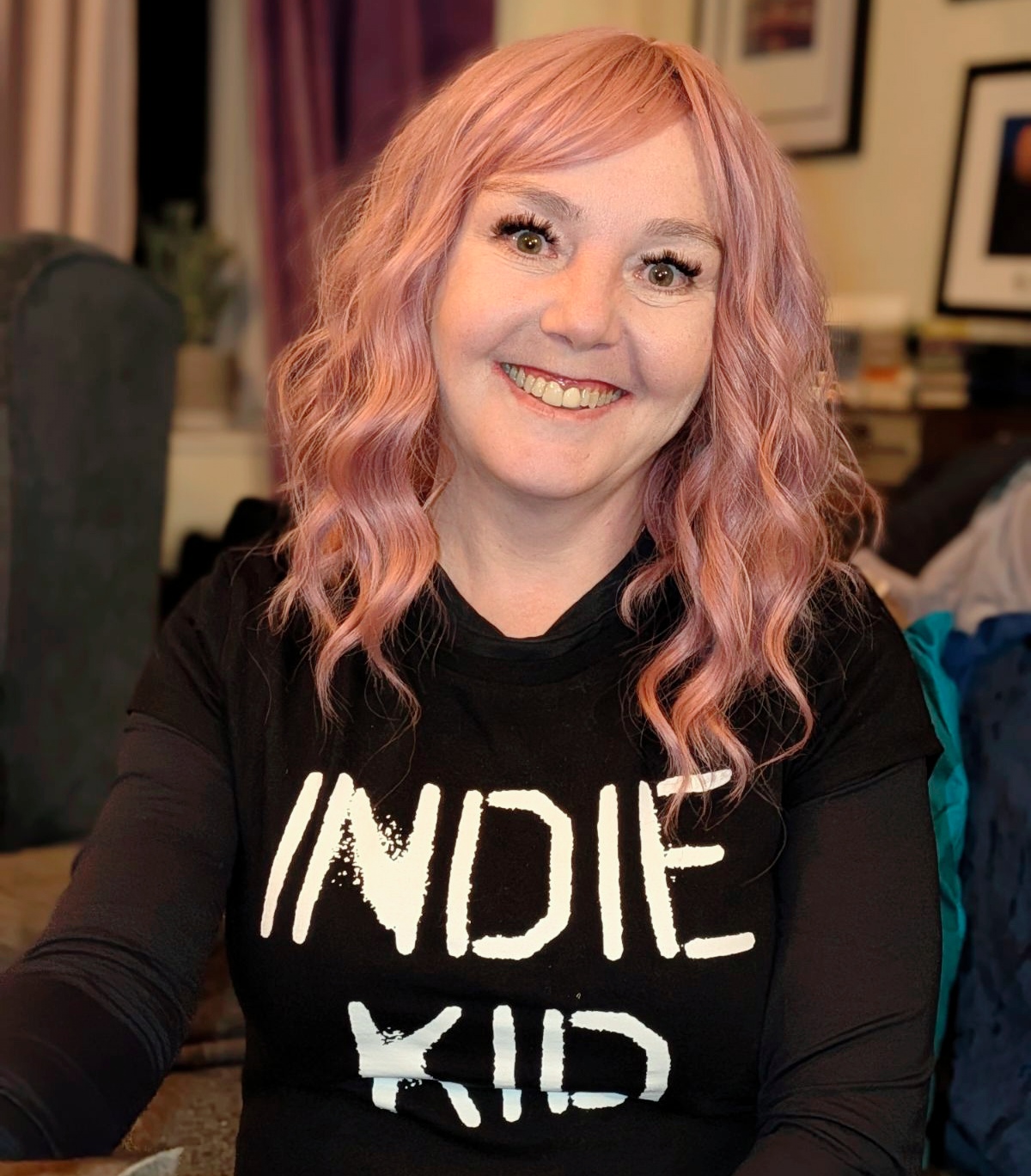 Me rocking my beautiful pink wig (because my hair's being a menopausal twat and thinning out) and my INDIE KID t-shirt, looking absolutely chuffed with myself. Fresh lashes courtesy of Hannah, proper smile, feeling like a million quid. This was taken yesterday when I felt GOOD and decided to ignore all common sense about pacing. Past Sha had no idea what Present Sha was going to go through. Past Sha was an optimistic fool.